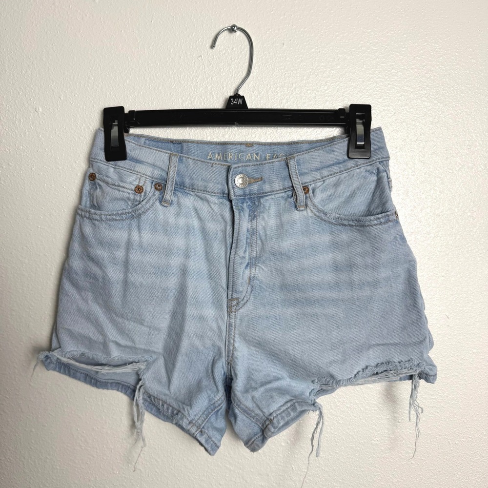 American Eagle Strigid Light Wash Mid Waisted Distressed Denim Shorts Size 00 - Picture 2 of 9